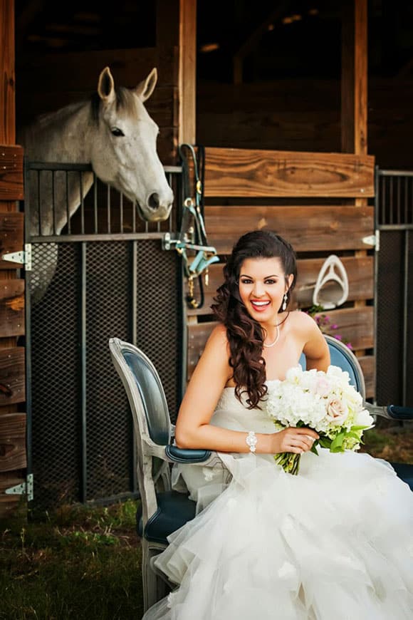 Bride at the stable with a horse