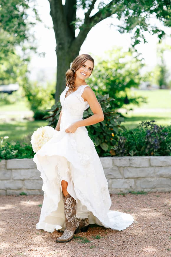 Brown cowboy boots with a wedding dress
