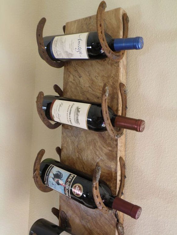 wood and horseshoe wine rack