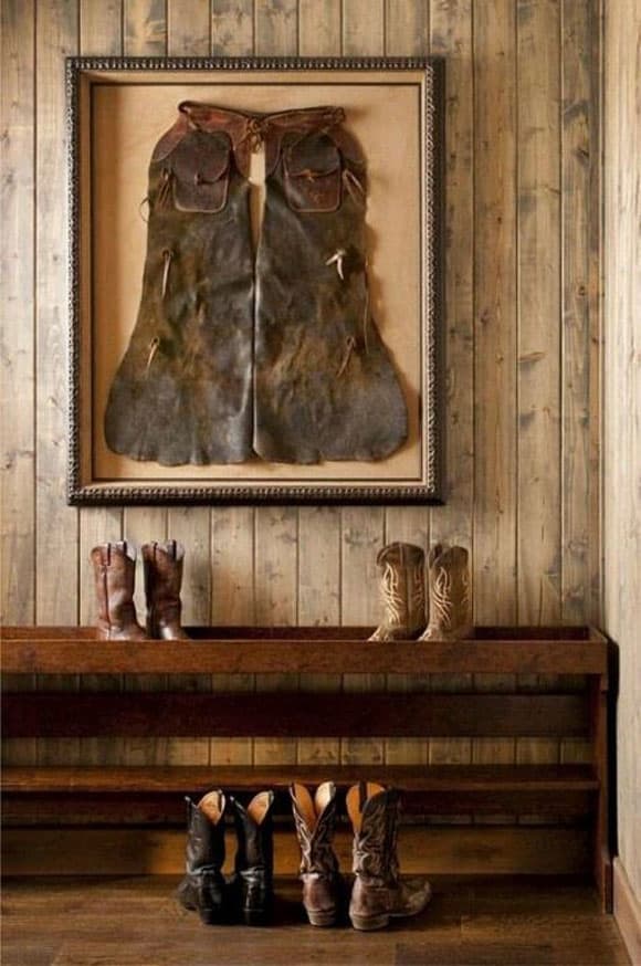Western entryway with chaps in a shadowbox