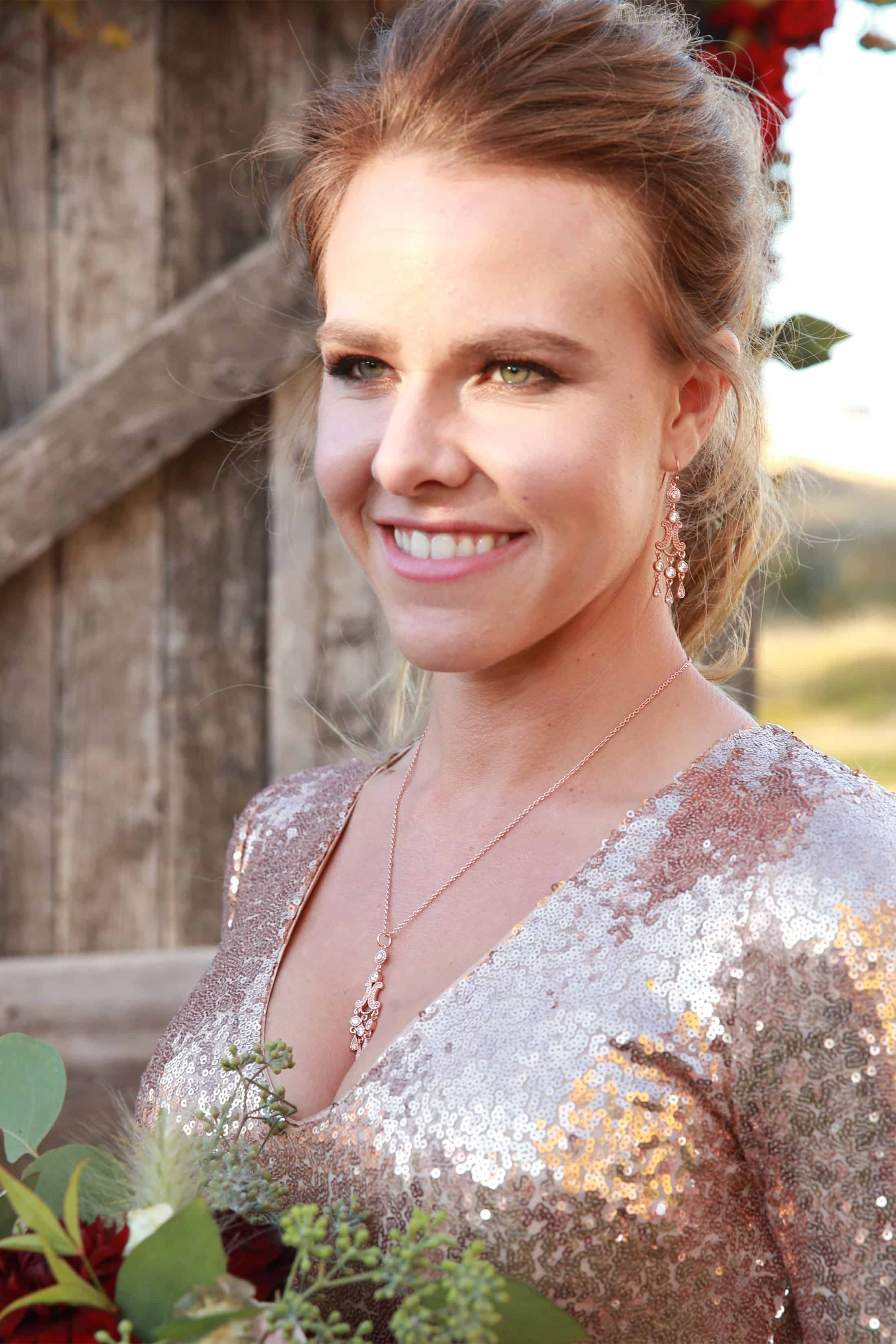 Rose gold necklace and earrings wedding set on a bride from Montana Silversmiths