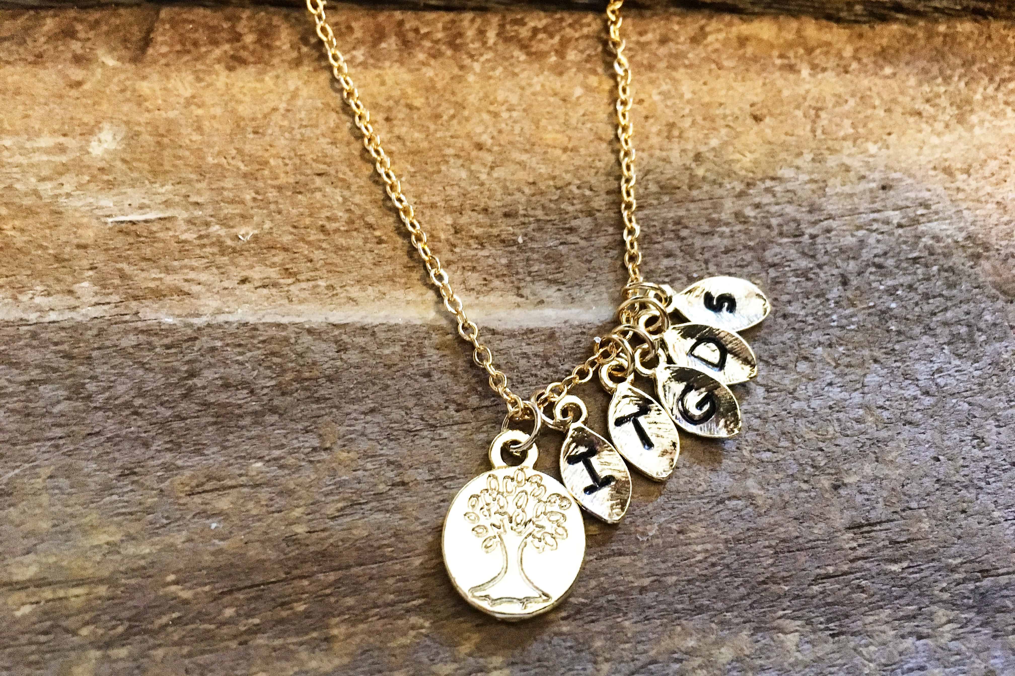 Family tree Gold necklace, starting at $17
