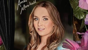 Amber Marsahall's signed headshots cowgirl magazine